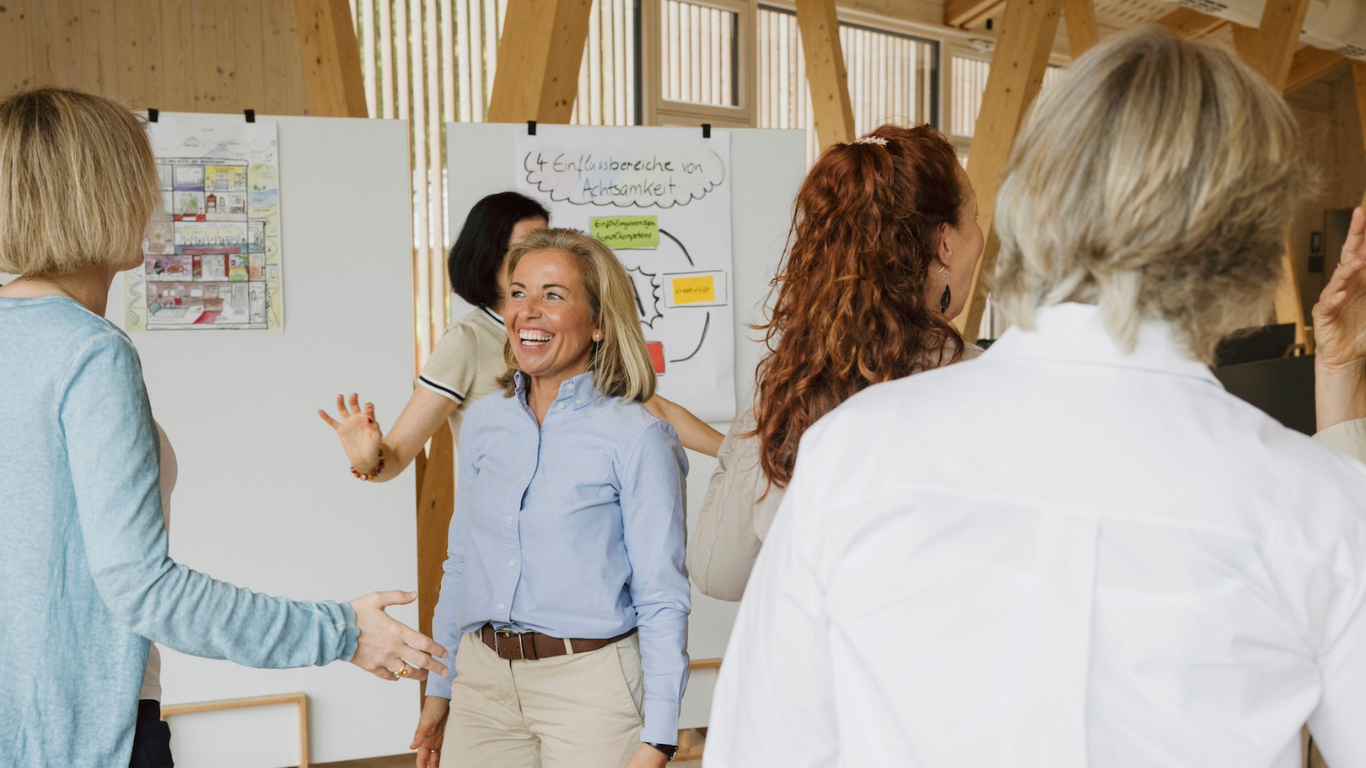 Lachende Workshop Teilnehmerin Mentoring Masterclass